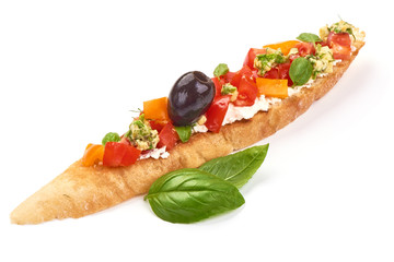 Italian Bruschetta with cottage cheese, tomatoes, garlic, olives and herbs. Spanish Tapas and Pinchos, isolated on white background