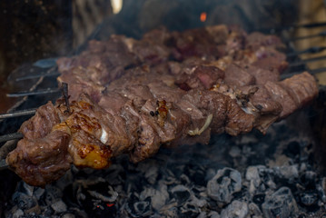 raw beef meat on skewers, barbecue