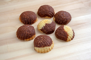 Cinnamon sandbakelse christmas cookies, two color, cocoa dark brown and vanilla light golden brown, delicious cookies