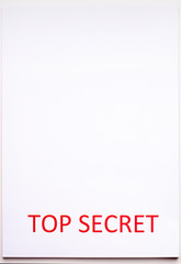 Red inscription TOP SECRET on a white sheet. Secrets and conspiracies. Archives of documents. Financial statements.