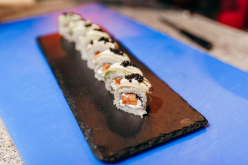 Japanese chef in restaurant cook sushi