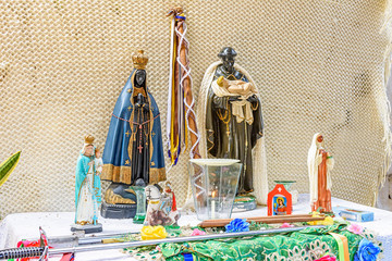 Brazilian religious altar mixing elements of umbanda, candomblÃ© and catholicism in the...