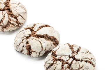 Group of three whole baked chocolate brownie cookie isolated on white background