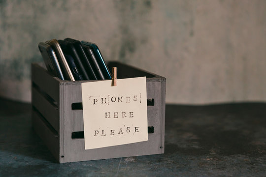 Mobile phone holder with sign