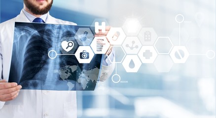 Close-up Doctor at hospital working with tablet pc