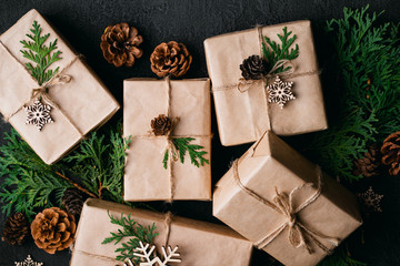 Christmas decorated gift boxes on dark background