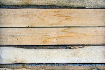 Part of the wall from wooden boards. Wood as a universal building material.