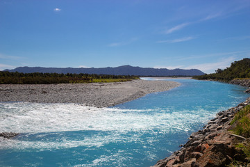 river of melted glacial water, West coast of New Zealand
