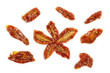 Lot of slices of dry red cherry tomato with flower in middle flatlay isolated on white background