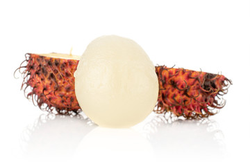 Group of one whole two halves of peeled fresh red rambutan isolated on white background