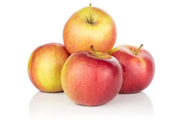 Group of four whole red apple jonagold isolated on white background