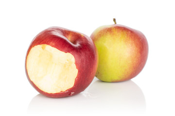 Group of two whole bitten red apple jonagold isolated on white background