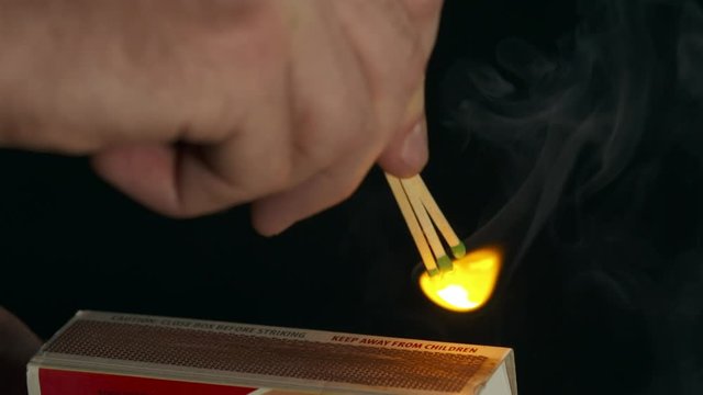 Lighting Three Matches on Matchbox Slow Motion