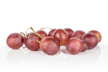 Lot of whole fresh purple grape rose heap isolated on white background