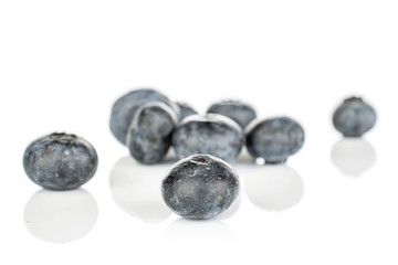 Lot of whole fresh blue blueberry isolated on white background