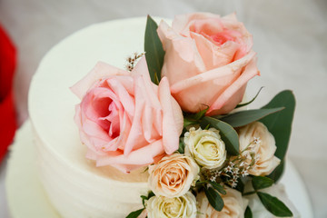 Big sweet wedding cake for newlyweds