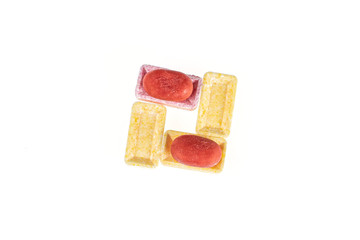Lot of whole arranged sweet pastel candy flatlay isolated on white background