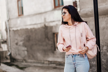 Beautiful model posing for the camera on the streets.