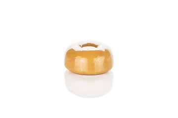 One whole caramel brown candy isolated on white background