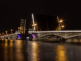 Fototapeta na wymiar Night St. Petersburg the raised bridge of the city