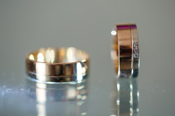 Gold wedding rings for newlyweds on wedding day