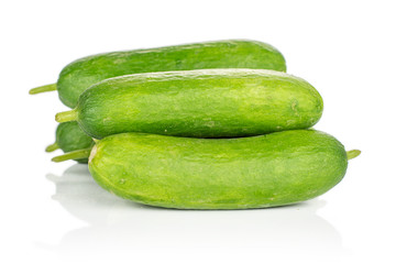 Lot of whole mini green cucumber isolated on white background