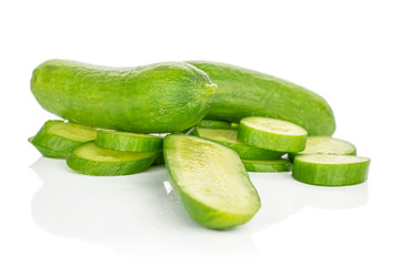Group of two whole lot of pieces of mini green cucumber isolated on white background