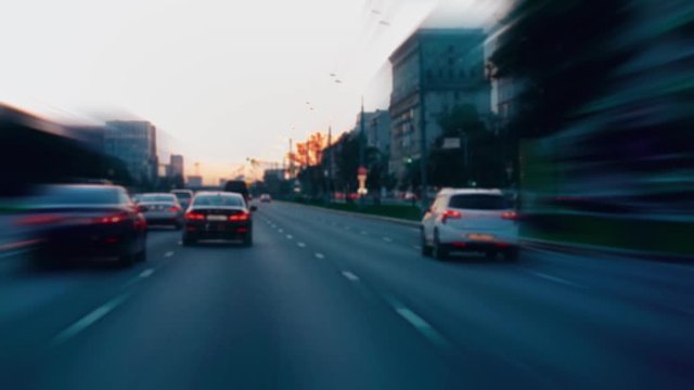 Hyperlapse view from the moving car. POV. Moscow. Day to night. Ideal for concepts such as futuristic cityscape, city life, etc. Amazing architecture. Ultra HD stock footage. Time Lapse