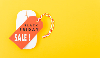 Internet online shopping marketing, Promotion Black Friday sale text on red tag label and white mouse