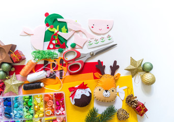 Fototapeta na wymiar Craft soft toy decor for Christmas tree elf felt.