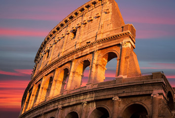 Famous Coliseum (Colosseum) of Rome at early sunset