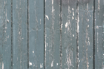 The old shabby painted wooden wall texture background