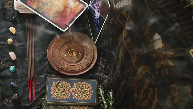 Top view of incense burning at an altar