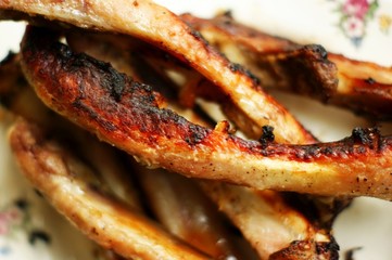 Roasted sliced barbecue pork ribs. Already eaten fried ribs