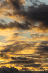 Colorful dramatic sky with clouds during sunset or sunrise