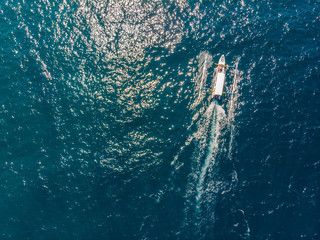 Aerial drone view of diving and snorkel boats around the beautiful tropical