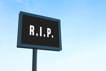 Billboard with abbreviation R.I.P. outdoors