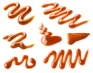 Liquid caramel on white background