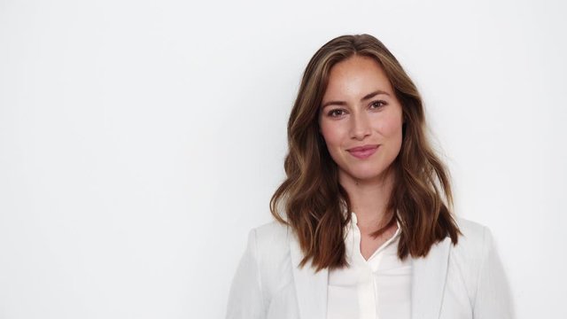 Smiling Businesswoman In White