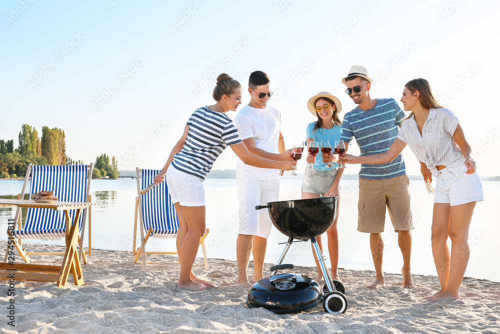 Canvas Prints Friends at barbecue party near river