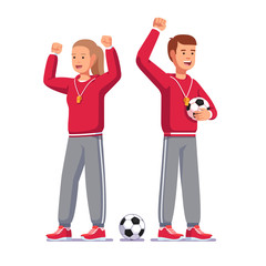 Soccer coaches raising hands and cheering players