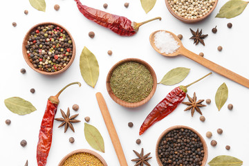 Different spices on white background