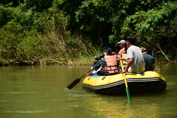 Group rowing on river