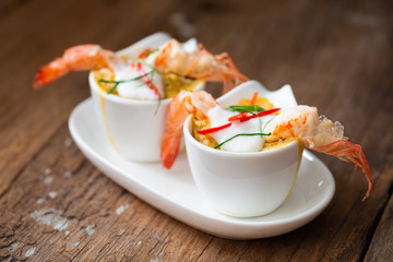 Steamed Seafood Curry Cakes with coconut cream and Prawn.