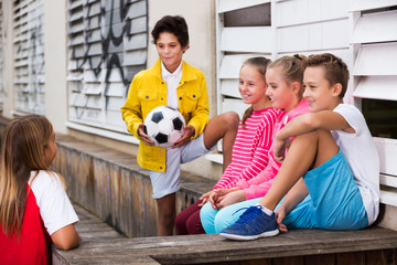 Fototapeta premium boys and girls are communicating outdoor