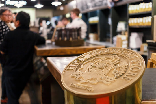 Seattle, Washington, USA - March 1, 2015_Sign of First Starbucks Store in Original Starbucks store, The first Starbucks coffee store at Pike Place Public Market in Seattle, established in 1971.