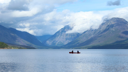 Canoe and lake with mountains