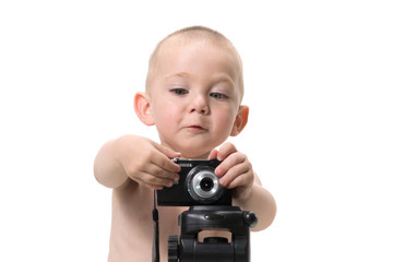Child using a camera on white background