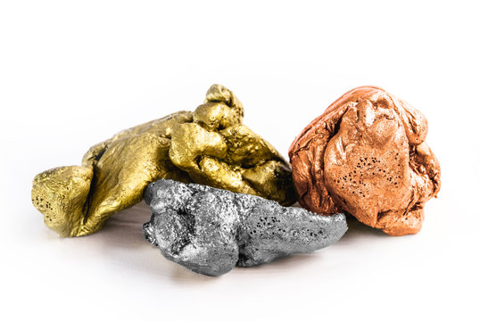 group of precious stone gold silver bronze on white background, rough stones, mining and valuable stones. Mining Concept.
