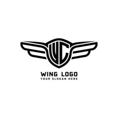 Fototapeta premium WC initial logo wings, abstract letters in the middle of black
